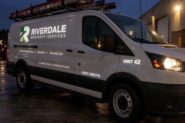Service van with reflective USDOT number, unit number and company lettering
