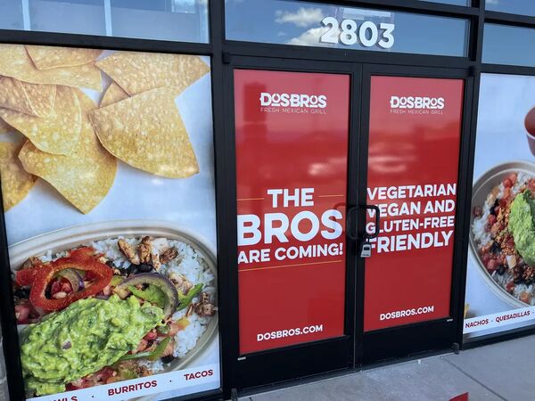 Restaurant front windows with full-color graphics